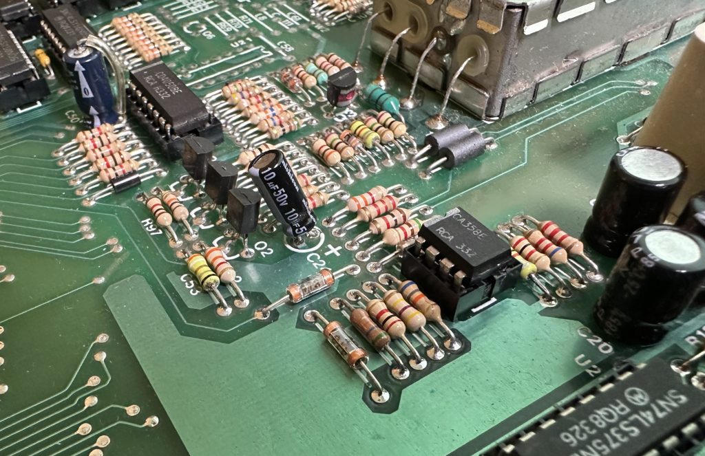 New C24 capacitor soldered into the sound amplifier part of the circuit board